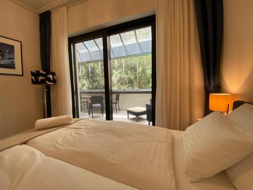 Posteľ alebo postele v izbe v ubytovaní Five Stars Experience Bestern