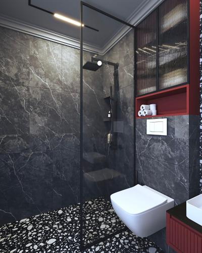 a bathroom with a shower and a toilet and a sink at Apartments Lura in Peje