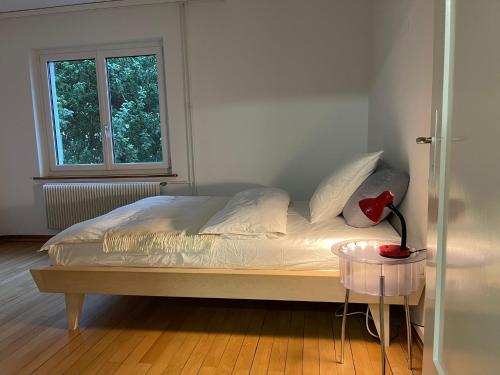 Postel nebo postele na pokoji v ubytování au quartier