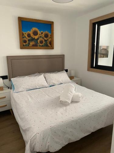 Postel nebo postele na pokoji v ubytování Casa Linda