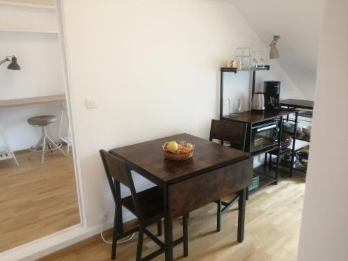 Køkken eller tekøkken på Joli studio paisible proche stade de France