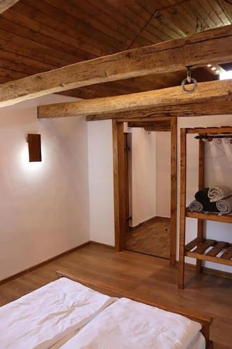 Postel nebo postele na pokoji v ubytování Salaš u Bregu in Cheile Carasului