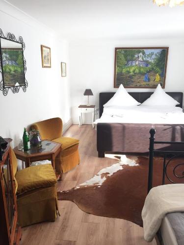 Ένα ή περισσότερα κρεβάτια σε δωμάτιο στο Royal Guest House