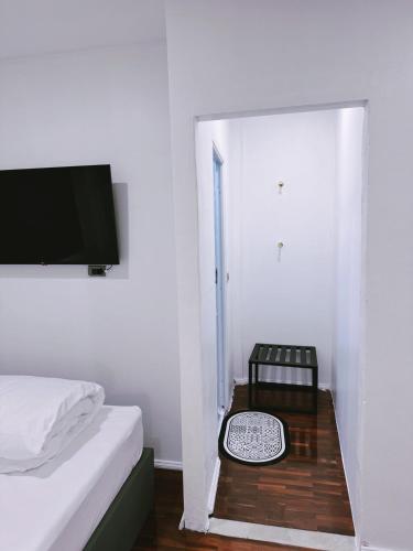 Zleepinezz Hostelにあるベッド