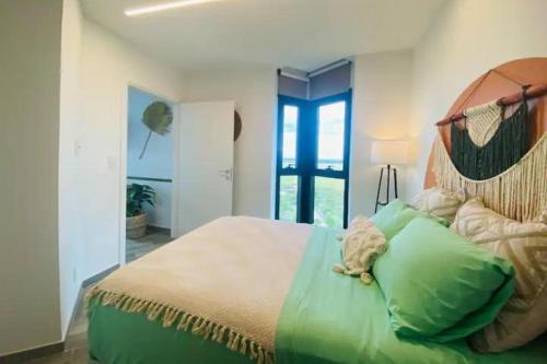 Cama o camas de una habitación en Luxurious Apartment with Charming Lake View in Mérida