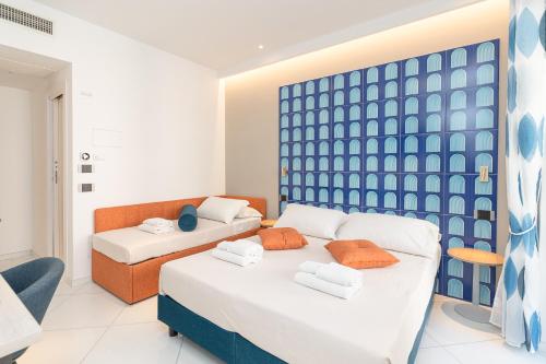Postel nebo postele na pokoji v ubytování B&B Maiori Suites
