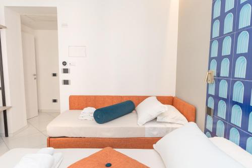 Postel nebo postele na pokoji v ubytování B&B Maiori Suites