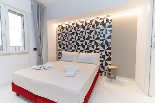 Postel nebo postele na pokoji v ubytování B&B Maiori Suites