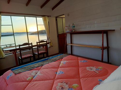 Postel nebo postele na pokoji v ubytování Ecolodge INTI WATA