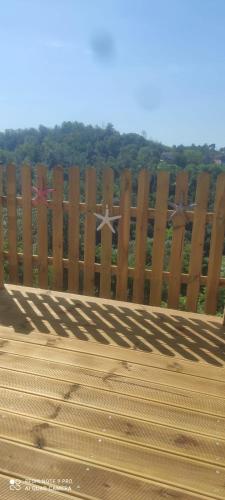a wooden bench with a star on the back of it at B&B TERRA DI COLLINA in Montegrosso dʼAsti
