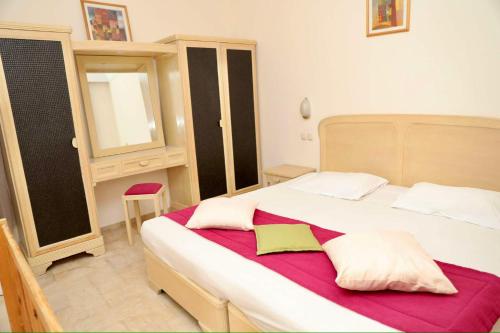 Postel nebo postele na pokoji v ubytování Appart Hotel Rodes