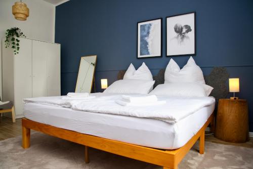 Кровать или кровати в номере Garten, Terrasse, 93 m2, 5 Min bis zur Warnow