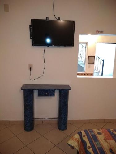 TV a/nebo společenská místnost v ubytování Casa de Huéspedes Hotel'O