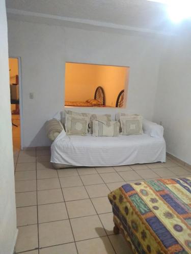 Postel nebo postele na pokoji v ubytování Casa de Huéspedes Hotel'O