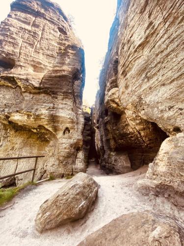 a canyon with some rocks and a dirt road at Mezi stromy 165 in Česká Kamenice