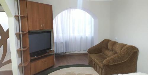 TV a/nebo společenská místnost v ubytování Город Окница, улица дом 46, квартира 11