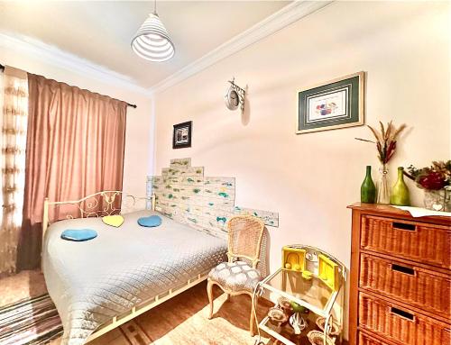 a childs bedroom with a bed and a dresser at Cosy One bedroom Appartment with open balcony terrace, near Opera, Tumanyan & Pushkin streets, Self Check in, city centre, Yerevan in Yerevan