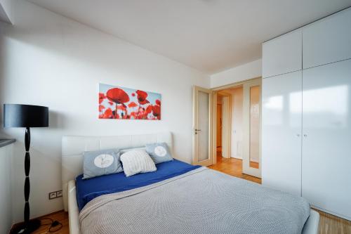 Postel nebo postele na pokoji v ubytování River diamond residence