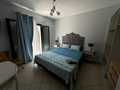 Ένα ή περισσότερα κρεβάτια σε δωμάτιο στο Aetheria Villa Kefalonia