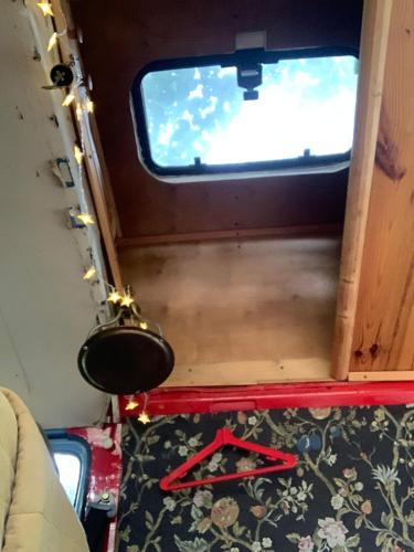 a view of the inside of a train with a window at Nad rybníkem Hnačov - rodinný rekreační areál in Hnačov