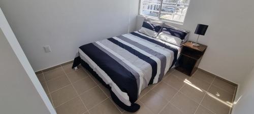 Una cama o camas en una habitación de Garde