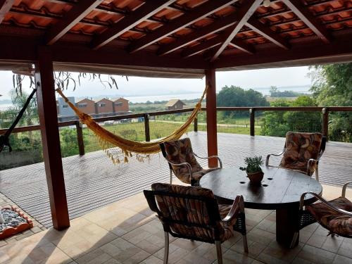 Balkón nebo terasa v ubytování Casa Lagoa e Praia Rosa