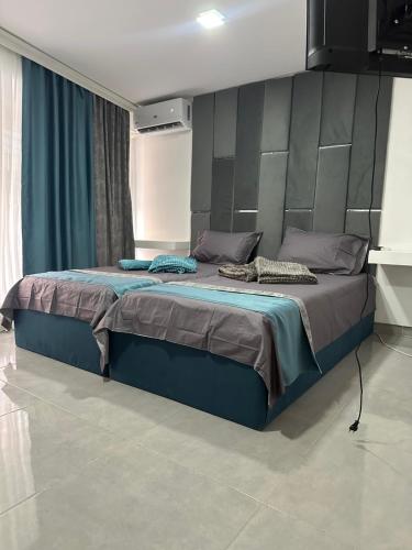 Postel nebo postele na pokoji v ubytování BLuxury apartments