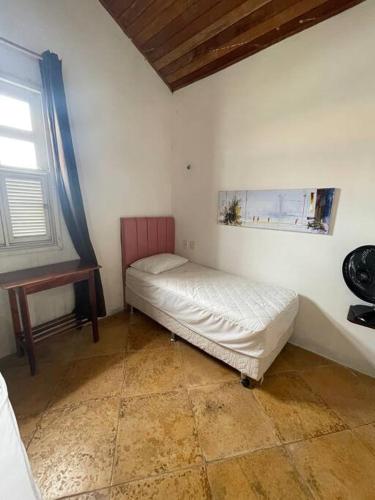 Casa DuVentu Praia Fontesにあるベッド