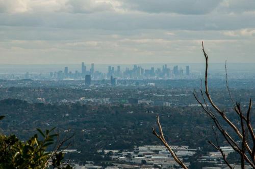 a view of a city with a city skyline at Romantic Retreat in the Dandenong Mountains in Kalorama