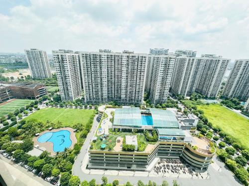 an aerial view of a large building with buildings at OceanPark Amazing Cozy Modern great view 3Beds in Gia Lâm Pho