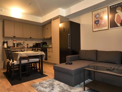 Kuchyň nebo kuchyňský kout v ubytování New Modern 2 room Apartment with 2 beds & FREE PARKING