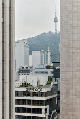 a view of a city with skyscrapers at HOTEL DRIP&DROP Myeongdong in Seoul