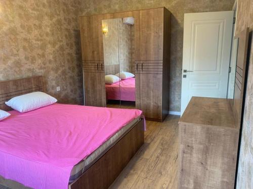Postel nebo postele na pokoji v ubytování Apartments Firuze