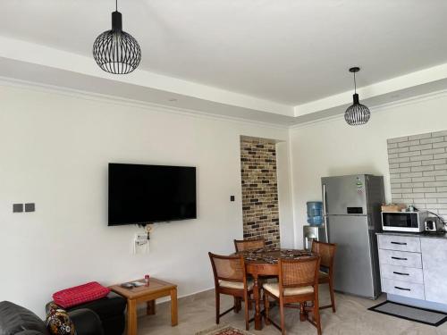 Una cocina o cocineta en Kgsuites