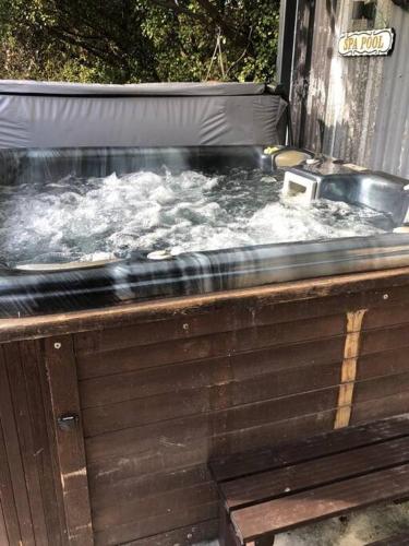 a hot tub with snow on top of it at Fantail at Bluestone Retreat in Leeston