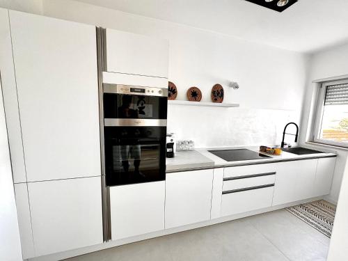Η κουζίνα ή μικρή κουζίνα στο Aptments3 - real estate solutions