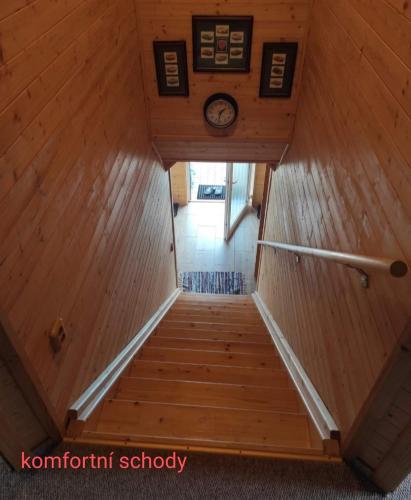 an overhead view of a staircase in a tiny house at Apartmánová chata Sečanda s bazénem, u Sečské přehrady in Seč