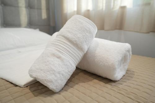 Una cama o camas en una habitación de Muko's Apartments