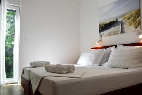 Postel nebo postele na pokoji v ubytování Villa Luna&Aurora