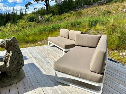 Posezení v ubytování Flott moderne hytte i Holterdalen, 4 soverom, 2 bad, Jacuzzi, garasje