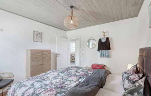 a bedroom with a bed and a couch at Kaisermantel in Irrhausen