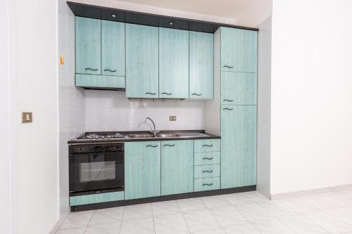 Una cocina o zona de cocina en Gio' House by BarbarHouse