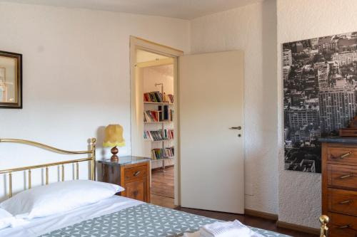 Postel nebo postele na pokoji v ubytování Un balcone su Spello