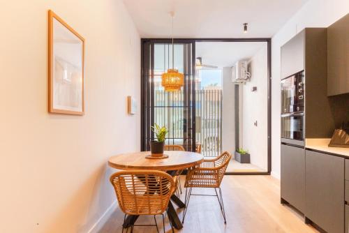 Kuchyň nebo kuchyňský kout v ubytování Mestalla Flats by Nomad Host