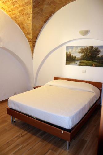 Postel nebo postele na pokoji v ubytování Caval di Posta