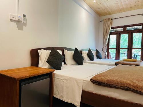 Postel nebo postele na pokoji v ubytování Wild Resort Ella