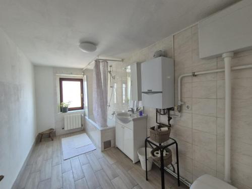 Kúpeľňa v ubytovaní Apartman Mislav. Udoban apartman u centru grada.