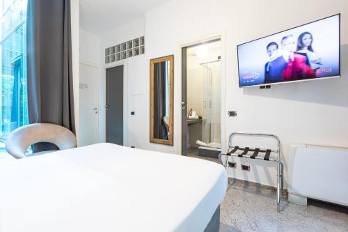 Televisyen dan/atau pusat hiburan di Città Studi Suites - Top Collection