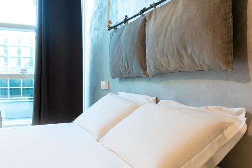 Katil atau katil-katil dalam bilik di Città Studi Suites - Top Collection