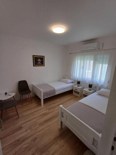 Postel nebo postele na pokoji v ubytování Guest House Mostar